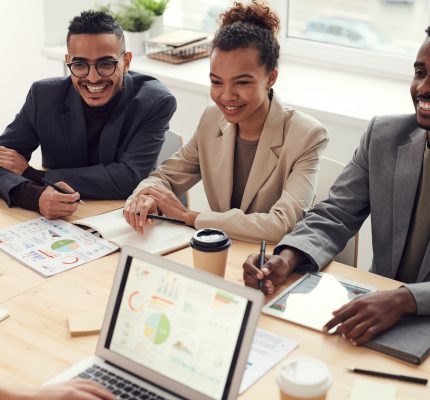 photo-of-three-people-smiling-while-having-a-meeting-3184338-big